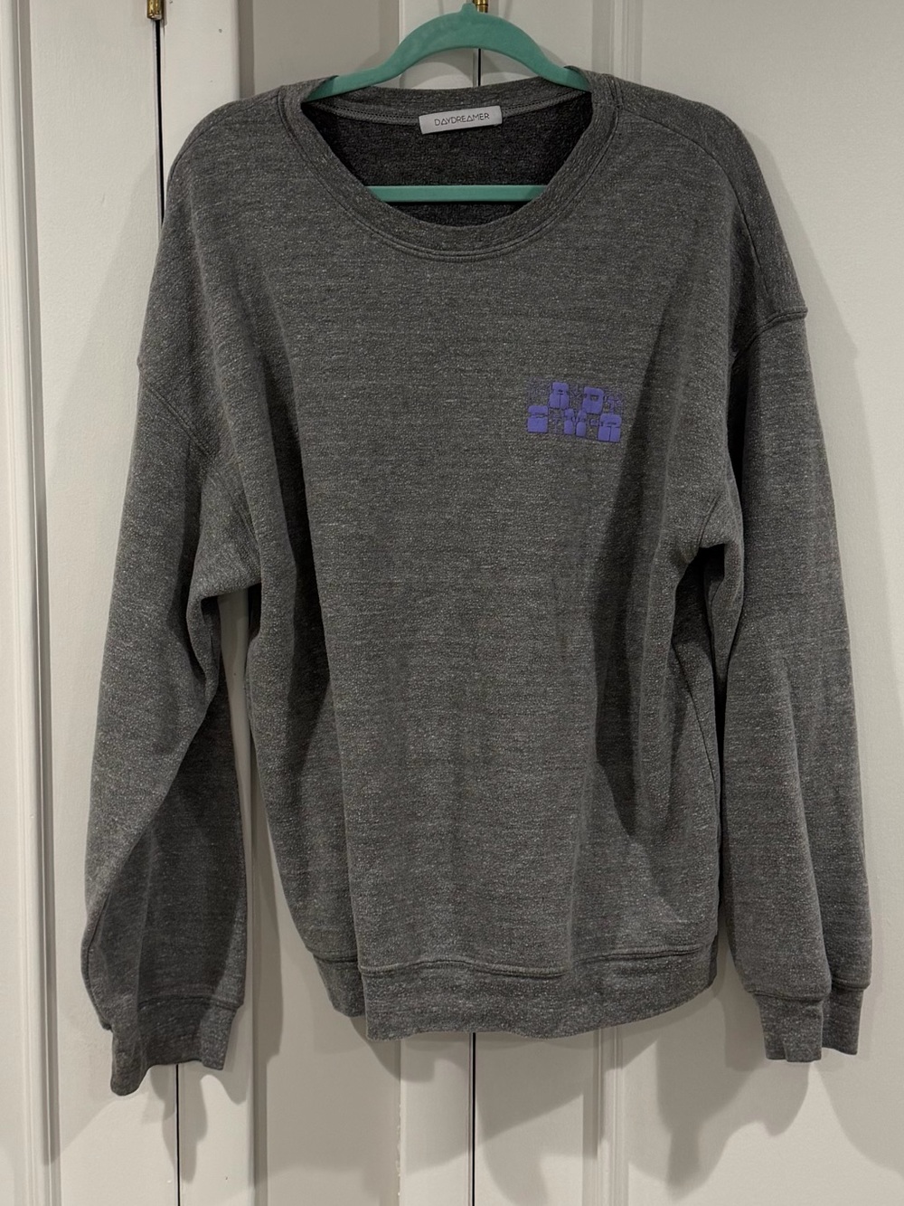 Daydreamer Gray Crewneck Sweatshirt with Purple Chest Logo